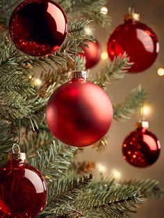 christmas ornaments hanging from the branches of a tree