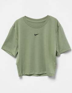 Nike Sportswear Essential Slim Crop Tee. Embroidered Nike Swoosh Logo On Center Chest. Ribbed Crew Neckline. Short Sleeve. Slim Fitting, Cropped Fit. 49% Polyester, 48% Modal, 3% Spandex. Machine Wash. Imported Cute Shirts To Buy, Long Short Sleeve Shirt, Cute Nike Tops, Nike Shirts Aesthetic, Nike Clothes Women Aesthetic, Styles For School Clothes, Nike Clothes Women's Outfit, Athletic Shirts Women, Cute 5th Grade Outfits For School