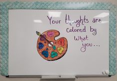 a white board with an image of a donut painted on it that says, your lights are colored by what you