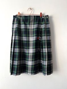 Vintage Women Tartan plaid wrap Skirt Wool blend Kilt Skirt Green Pleated Skirt High Waist Skirt Midi Checkered Skirt Size Extra large Label size: UK 18 Estimated size: XL Measurements: Length: 25.5"/ 64.5 cm Waist:  33"-34" / 84cm- 86.5 cm Please check measurements to insure a proper fit. Remember to allow yourself some extra room for movement. You can compare these with something from your closet that fits you well. This skirt will come to you freshly laundered and ready to wear. Please feel f Plaid Skirt For School, Plaid Lined Mini Skirt For School, Plaid Pleated Mini Skirt School Uniform, Preppy Plaid Skirt For School, Preppy Plaid School Skirt, Plaid Pleated Skort For School Uniform, Plaid Skort For School, School Uniform Plaid Skort, Plaid Mini Skirt For School