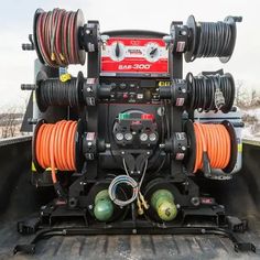 the back end of a truck with multiple wires on it