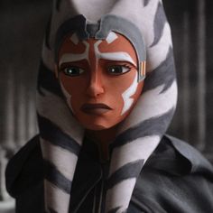 a star wars character wearing a hoodie and scarf