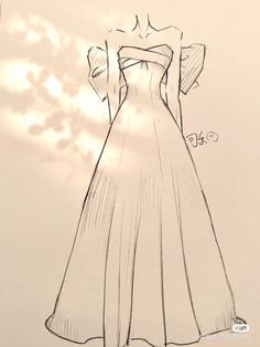 a drawing of a dress on a piece of paper