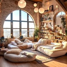 a living room filled with lots of furniture next to a large window covered in bookshelves