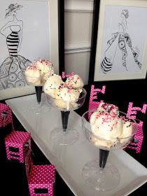 three ice cream sundaes with sprinkles in small glasses on a table