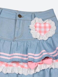 This denim mini skirt captures the kawaii aesthetic with its plaid layers, ruffle design, and heart-shaped plaid detail. Adorned with ribbons, lace, and bows, along with belt loops, it's a playful and stylish piece for casual or streetwear outfits. Kawaii aesthetic Plaid layer details Ruffle design Heart shaped plaid detail at front Ribbon & lace details Bows on skirt Belt loop details A-line Button & zip fastening Double pockets at front Cotton, polyester Cute High Waist Denim Skirt, Cute Cotton Mini Skirt With Ruffles, Cute Cotton Ruffled Skort, Cute Cotton Skort With Ruffles, Cute High-waisted Ruffled Mini Skirt, Cute High Waist Ruffled Mini Skirt, Cute High Waist Mini Skirt With Ruffles, Birthday Outfits Summer, Aesthetic Plaid