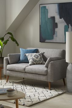 a living room scene with focus on the couch