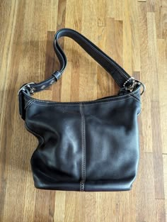 Vintage Coach Hobo Bag Black Silver Buckles and Grommets Oval Bottom Adjustable Strap Over the Shoulder Excellent Condition Coach Black Hobo Bag Vintage, Hobo Bag Outfit, Coach Vintage Bag, Coach Hobo Bag, Coach Hobo, Dream Bags, Buckle Bag, Slouchy Bag, Vintage Coach Bags