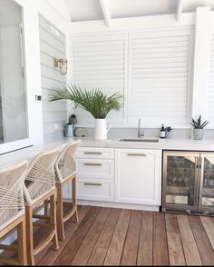 the kitchen is clean and ready to be used for cooking or relaxing on the deck