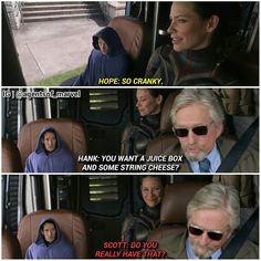 an older man and woman sitting in the back seat of a car talking to each other