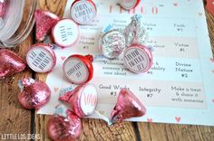 valentine's day candies and candy are on the table next to each other