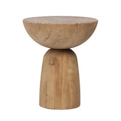 a small wooden stool sitting on top of a white floor