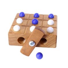 a wooden game with blue and white balls