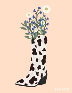 a cow print boot with flowers in it's heel on a pink background,