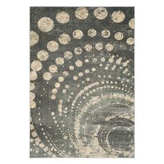 an area rug with circles and dots on it