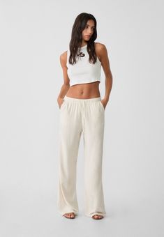 Loose-fitting linen blend trousers - Women's fashion | Stradivarius United States Viscose Wide-leg Pants With Elastic Waistband, Chic High-waisted Viscose Pants, Summer Wide-leg Viscose Pants, Summer Viscose Wide-leg Pants, Relaxed Fit Viscose Wide-leg Pants, Casual Wide Leg Viscose Pants, Relaxed Fit High-waisted Viscose Pants, High-waisted Relaxed Fit Viscose Pants, Viscose Wide-leg Pants For Summer