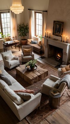 a living room filled with furniture and a fire place in the middle of the room