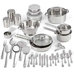 an assortment of stainless steel cookware and utensils