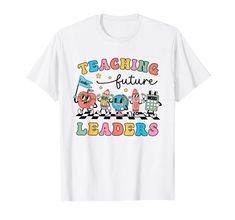 a white t - shirt with the words teaching future leaders in colorful letters on it