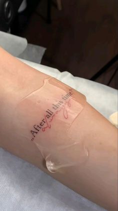 a person with a tattoo on their arm that says, atenealla dispensa