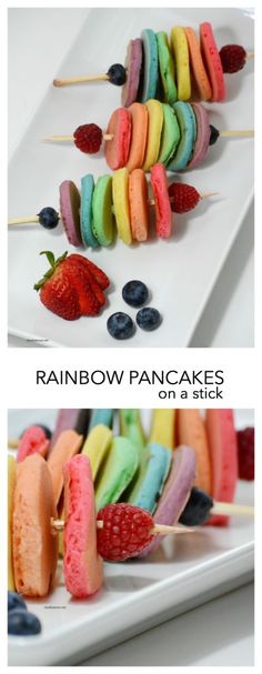 rainbow pancakes on a stick with berries and blueberries