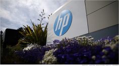 the hp logo is seen in front of some flowers