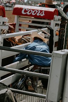 the cowboy is sleeping in his truck bed