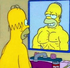 the simpsons is looking at himself in the mirror