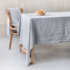 a table with two chairs and a plate on it