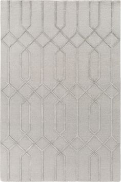 a white rug with an abstract design on the bottom and sides, in grey tones