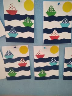 four pieces of paper with boats painted on them