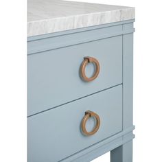 a blue dresser with marble top and brass handles