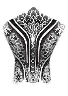 an intricate black and white design on the back of a woman's body