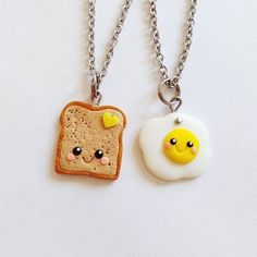 two pieces of bread and an egg on a chain