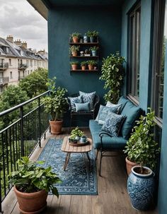 a balcony with potted plants and furniture