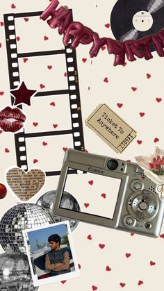 a camera and some pictures on a white background with red heart shaped decorations around it