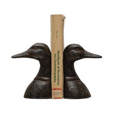 a bookend with two ducks on it