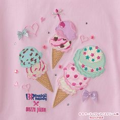 three ice cream cones with bows and hearts on pink fabric, decorated with sequins