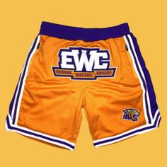 👖 The Edward Waters College Athletic Orange Shorts are ideal for any student-athlete or sports fan. These shorts are made of high-quality materials and are designed to provide the highest ease and durability during even the most intensive exercise and games. These shorts, which feature the iconic orange and gold colors of Edward Waters College, exude school spirit and pride, allowing you to show off your support for your favorite college sports team. 👖 The EWC athletic Orange Shorts are not only fashionable but also practical. They'll keep you cool and dry no matter how hard you push yourself thanks to their breathable and sweat-wicking fabric. The elastic waistband ensures a comfortable and snug fit, while the roomy pockets hold your essentials like keys, phone, or music player. ✅ FEATU Track Training, Push Yourself, Orange And Gold, Student Athlete, Orange Shorts, Fitness Gifts, Gold Colors, Training Shorts, College Sports