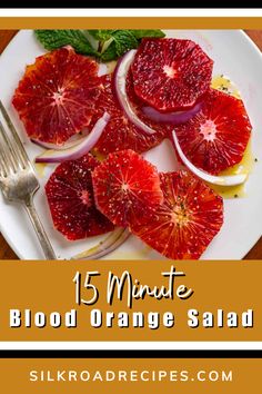 blood orange salad on a white plate with silverware and fork next to it is the title text reads 15 minute blood orange salad