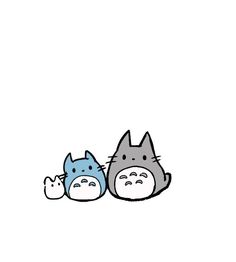 totoro and totoro sitting next to each other