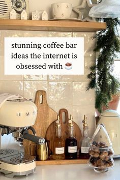 a coffee maker sitting on top of a counter next to other kitchen accessories and items