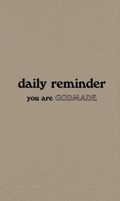 the words daily reminder you are godmade on a beige background with black text that reads,