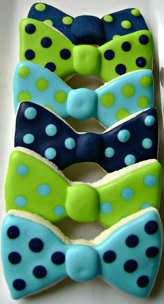 two pictures of decorated cookies with bows and polka dots, one is blue and the other is green