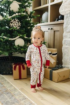 Embrace the magic of the holiday season with our Red Nutcracker Bamboo Cozy Set, perfect for making cherished memories with the whole family. Crafted from ultra-soft and breathable bamboo fabric, this festive set ensures a cozy and comfortable night's sleep. Available in sizes from 0-3 months to 11/12 years, it's perfect for your little ones, while matching adult pajamas let everyone join in on the fun. Ideal for Christmas morning photos, holiday movie nights, or simply enjoying the winter seaso