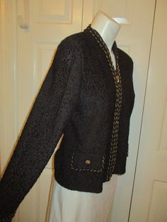 "Known for their gorgeous quality knits this Toula jacket/cardigan is no exception. From Monkeys in Richmond, Va. They were an upscale boutique. The textured knit is 75% wool, 25% rayon. Dry clean. It's a dark brown with black texture and braiding. Zip closure. Faux front flap pockets. Braided detail along the front, pocket flap edge and cuffs have gold chains woven in. Rhinestone buttons on the flaps. It has shoulder pads tacked in. Un lined. Beautiful condition. Size 6. It measures 21 1/2\" L. Cardigan Blazer, Mannequin Dress, Lounge Robes, Black Texture, Jacket Cardigan, Evening Jackets, Long Knit, Feb 13, Richmond Va