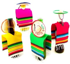 four mexican style items are displayed on a white surface