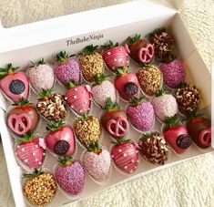 chocolate covered strawberries are arranged in a box