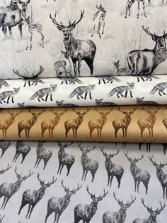 three different types of deer printed on fabric