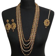 Jewellery set includes-  Diamonte layered mala Tikka Earings Bollywood Necklaces With Latkans For Wedding, Bollywood Style Necklaces With Latkans For Wedding, Bollywood Style Necklace With Latkans For Wedding, Bollywood Style Wedding Necklaces With Latkans, Gold Bridal Sets With Stone Work For Celebration, Bollywood Style Jewelry With Latkans For Wedding, Bollywood Style Gold Jewelry With Stone Work, Latkans Jewelry For Wedding And Diwali, Elegant Wedding Mala With Stone Work